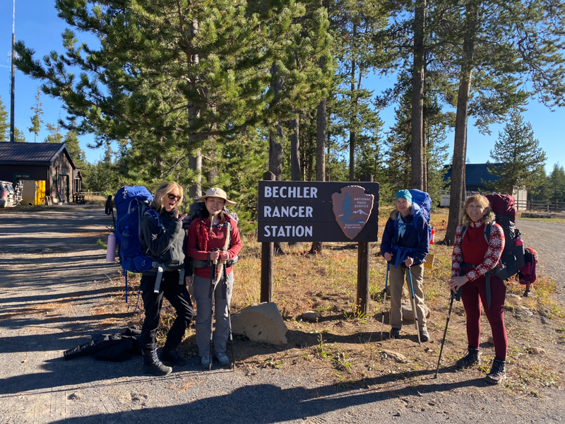 adventures for all group posing by the bechler ranger station sign